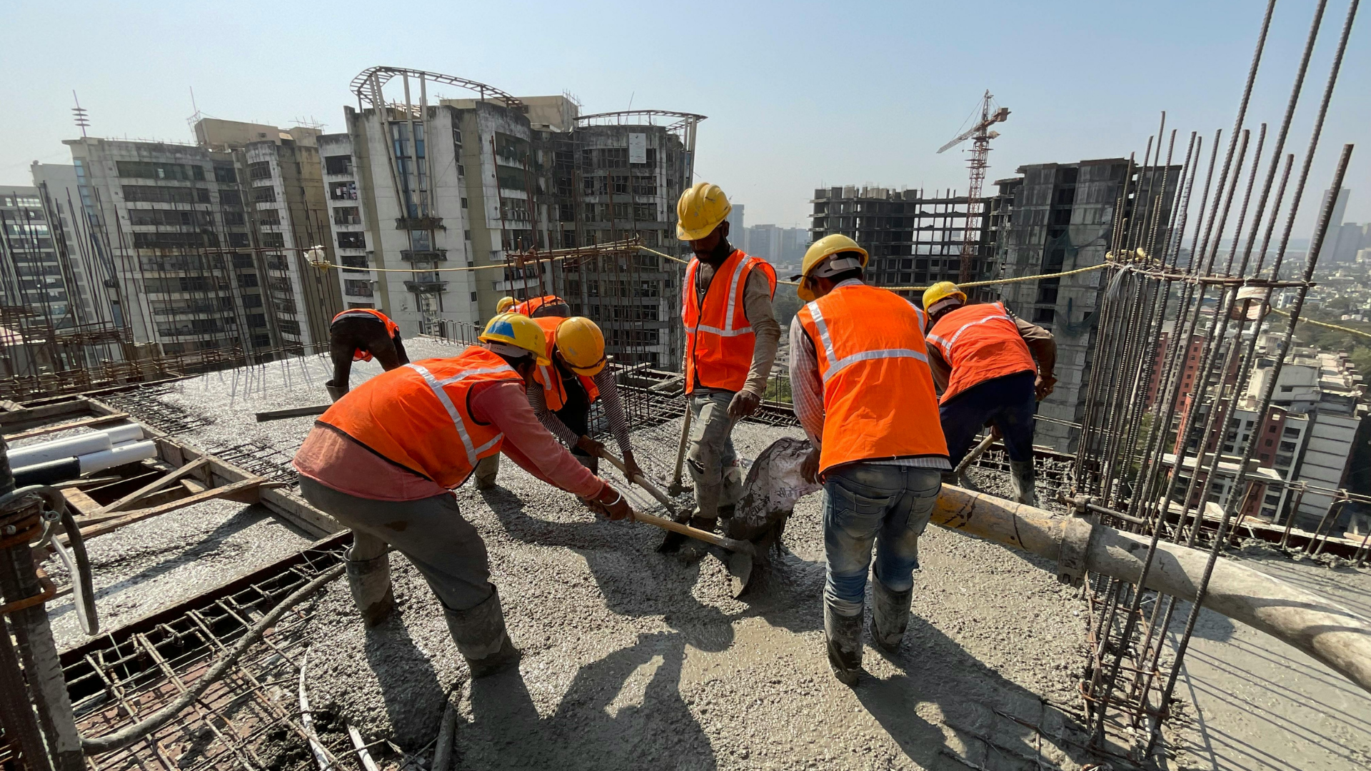 Construction team placing concrete